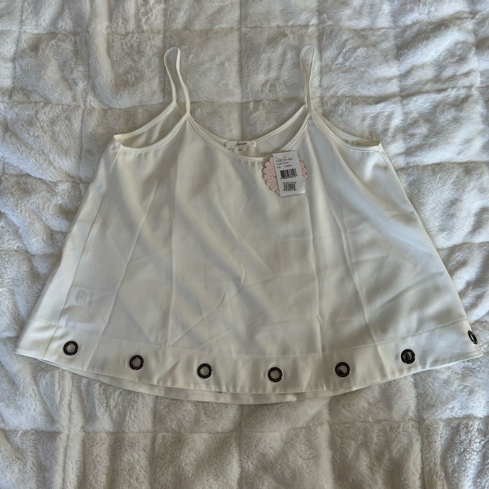 White Tank with Metal Rimmed Holes